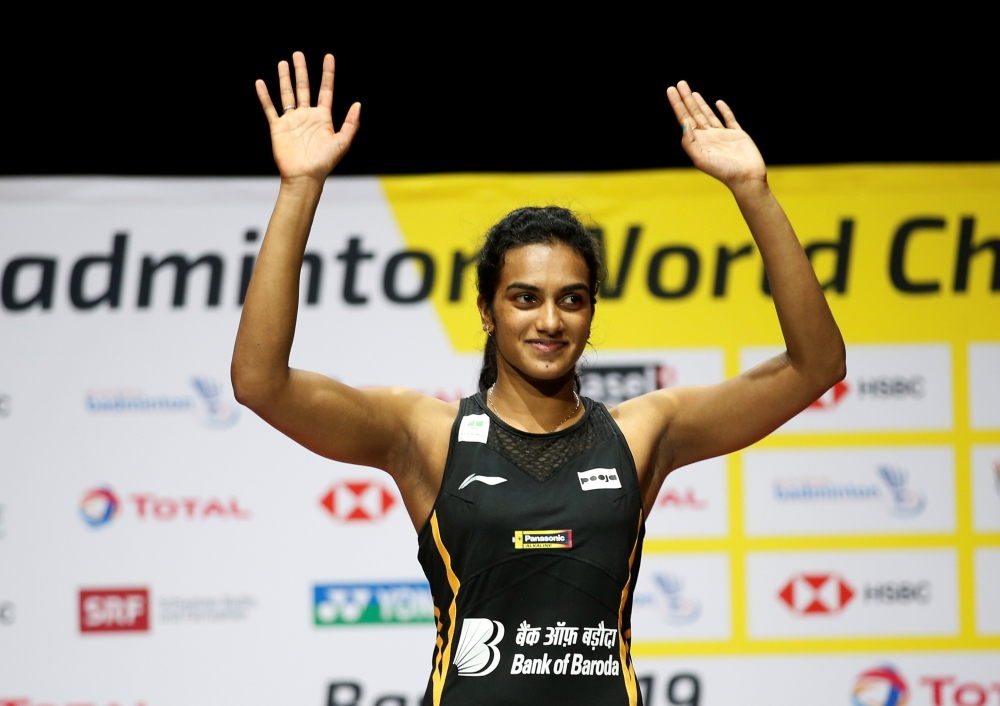 India's Pusarla Sindhu celebrates on the podium after winning the Women's 2019 Badminton World Championships singles final at St. Jakobshalle Basel, Basel, Switzerland, on Sunday. — Reuters