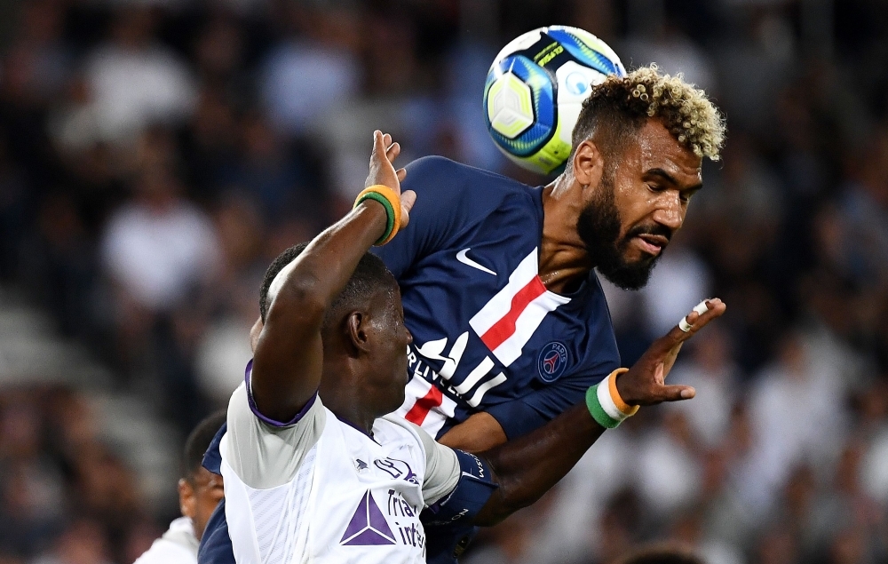 Paris Saint-Germain's Cameroon forward Eric Maxim Choupo-Moting heads the ball during the French L1 football match between Paris Saint-Germain (PSG) and Toulouse (TFC) at the Parc des Princes stadium in Paris, on Sunday. — AFP