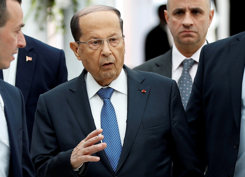 Lebanese President Michel Aoun gestures upon his arrival at Tunis-Carthage International Airport to attend the Arab Summit, in Tunis, Tunisia, in this March 30, 2019 file photo. — Reuters