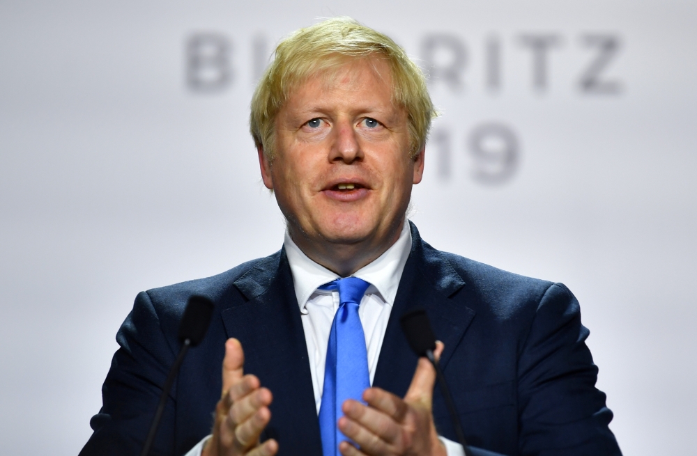 Britain's Prime Minister Boris Johnson speaks during a news conference at the end of the G7 summit in Biarritz, France, on Monday. — Reuters