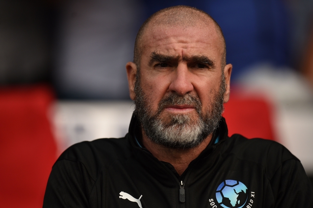 In this file photo taken on June 10, 2018, former French international Eric Cantona looks on before an England vs Soccer Aid World XI charity football match for Soccer Aid for Unicef at Old Trafford in Manchester, northwest England. — AFP