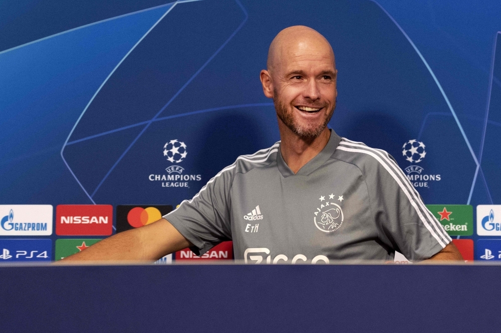 Ajax Amsterdam's Dutch head coach Erik ten Hag smiles during a press conference in Amsterdam, The Netherlands on Tuesday, on the eve of their UEFA Champions League play-off first leg football match against APOEL Nicosia. — AFP