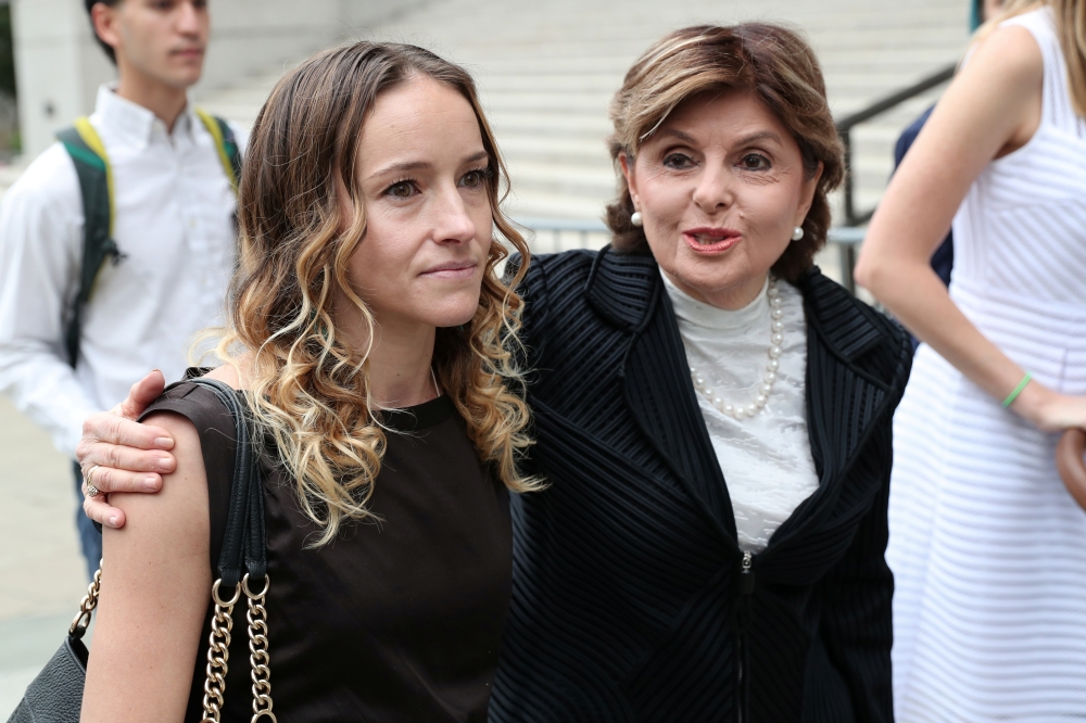 Gloria Allred, representing alleged victims of Jeffrey Epstein, arrives with an unidentified women for a hearing in the criminal case against Jeffrey Epstein, who died this month in what a New York City medical examiner ruled a suicide, at Federal Court in New York, on Tuesday. — Reuters