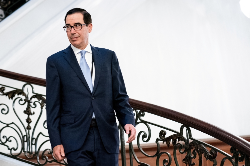 US Treasury Secretary Steven Mnuchin walks to a working breakfast at the G7 Summit in Biarritz, France, in this Aug. 25, 2019 file photo. — Reuters