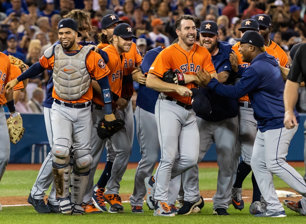 Houston Astros starting pitcher Justin Verlander (35) celebrates with teammates after throwing a no hitter against the Toronto Blue Jays at Rogers Center. — Reuters