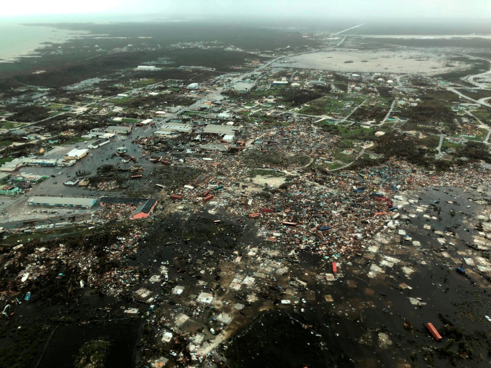 An aerial view shows devastation after hurricane Dorian hit the Abaco Islands in the Bahamas, Tuesday, in this image obtained via social media. -Reuters