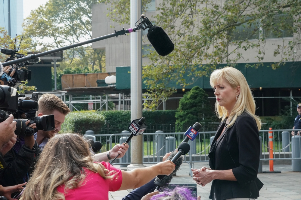 Attorney Sigrid McCawley, lawyer for Jeffrey Epstein's alleged victims, speaks outside Manhattan Federal Court following a hearing in a defamation lawsuit filed by one of Jeffrey Epstein's alleged victims, Virginia Giuffre, in New York, on Wednesday. — Reuters