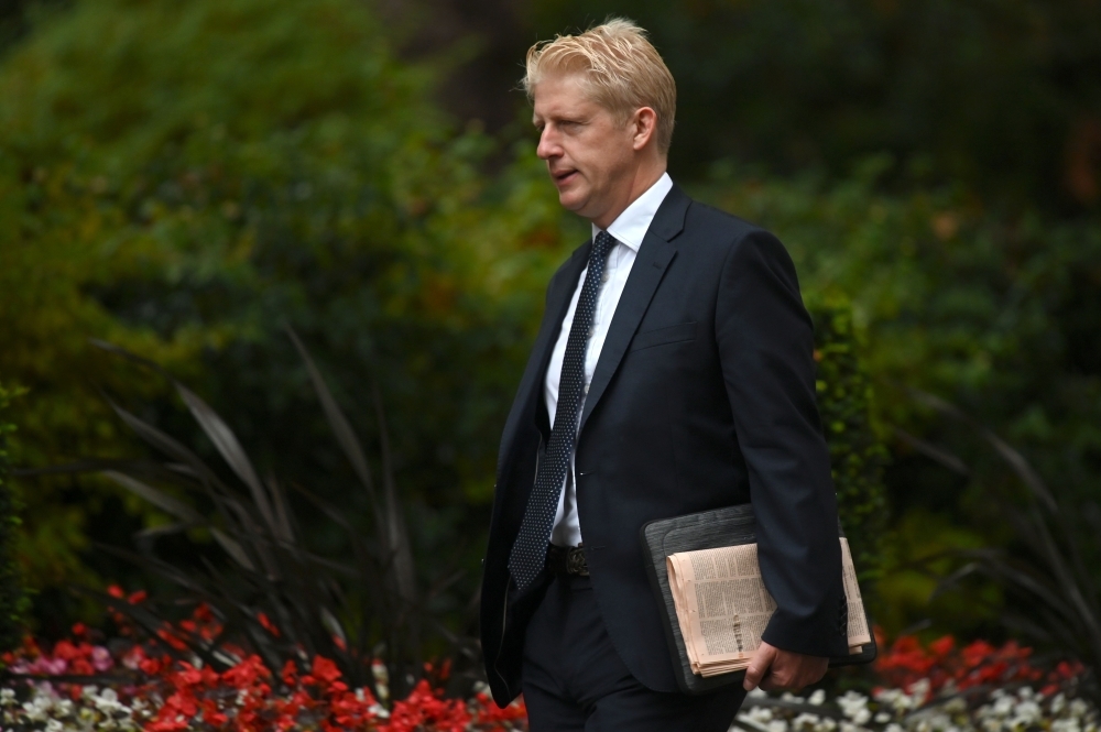 Britain's Minister of State for Universities Jo Johnson arrives to attend a meeting of the Cabinet at 10 Downing Street in central London on Wednesday. — AFP