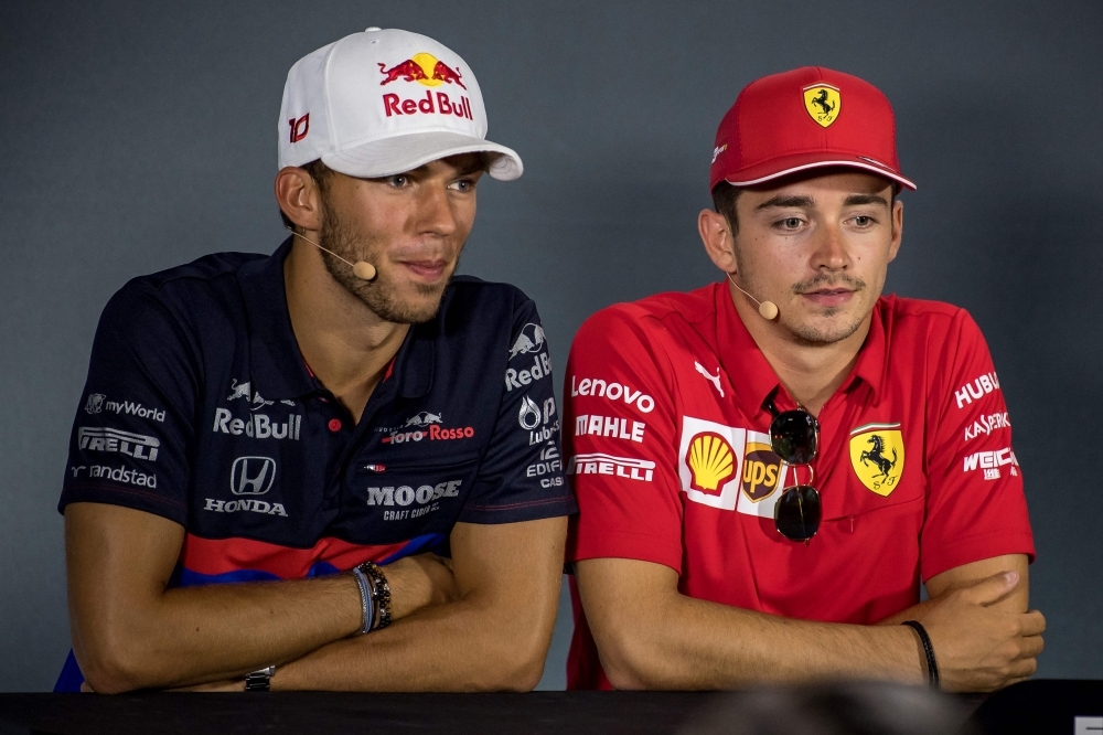 Ferrari's Monegasque driver Charles Leclerc (R) and Toro Rosso's French driver Pierre Gasly attend a press conference at the Autodromo Nazionale circuit in Monza on Thursday ahead of the Italian Formula One Grand Prix. — AFP 