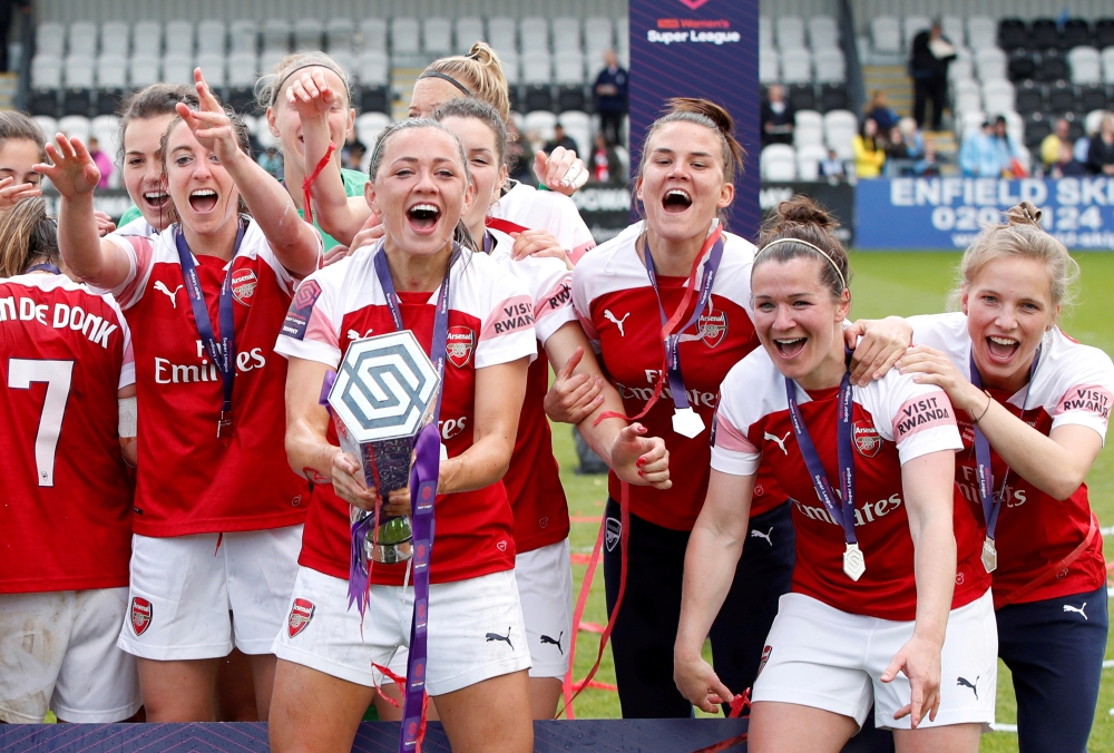 Manchester City's Steph Houghton lifts the trophy as she celebrates with teammates after winning the Women's FA Cup against West Ham United at the Wembley Stadium, London, Britain on May 4, 2019. — Reuters