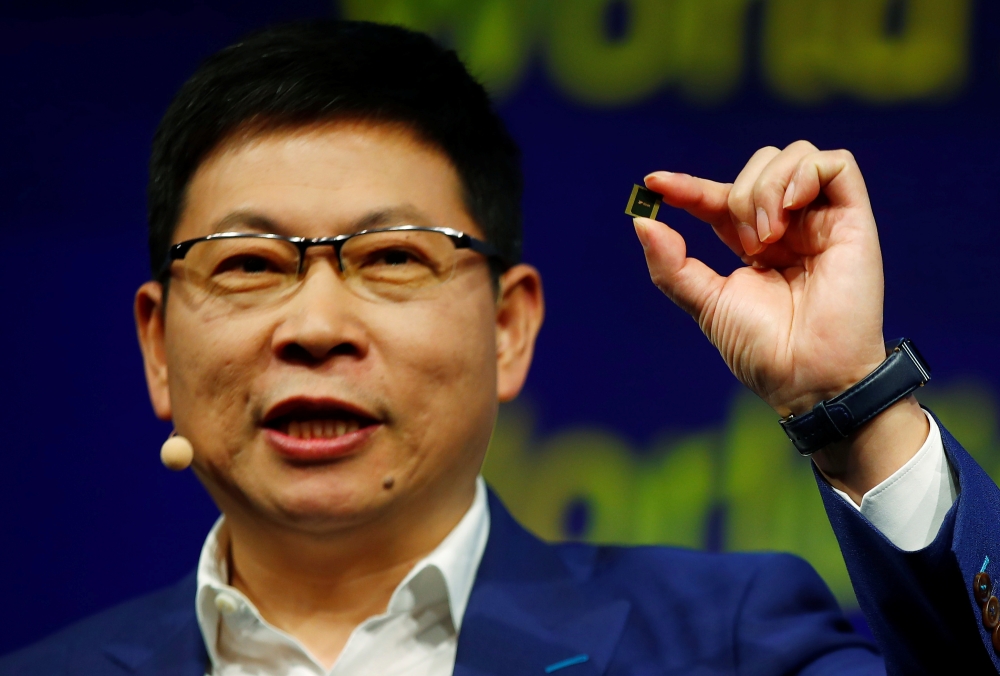 Richard Yu, CEO of Huawei's consumer business group, presents the new Kirin 990 5G chipset at the IFA consumer tech fair in Berlin, Germany, Friday. — Reuters