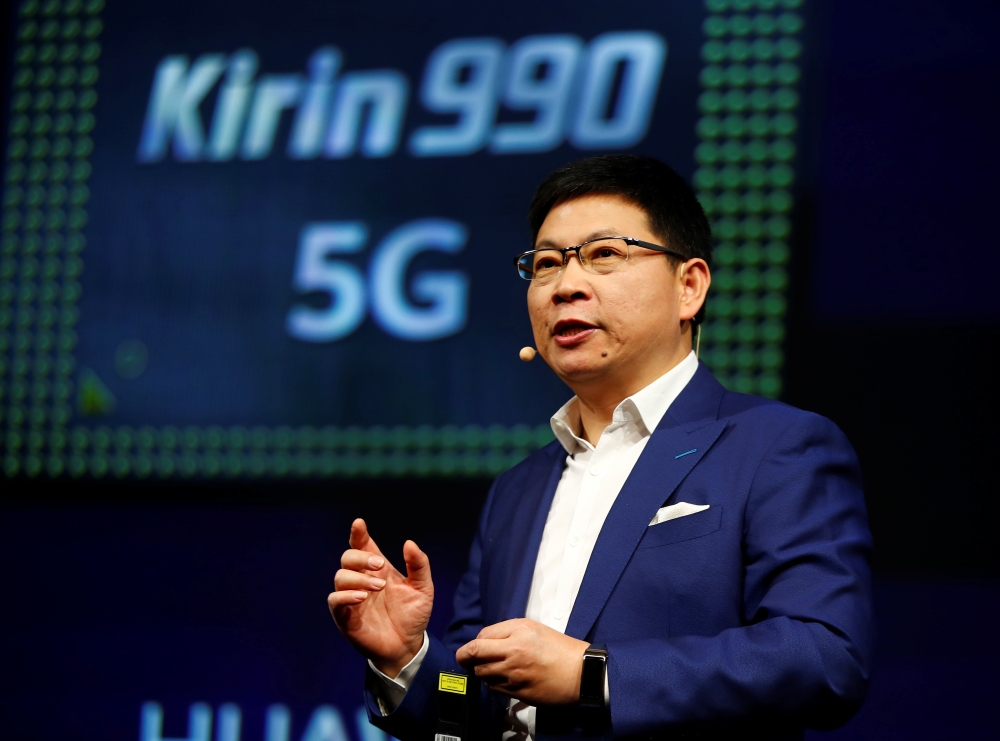 Richard Yu, CEO of Huawei's consumer business group, presents the new Kirin 990 5G chipset at the IFA consumer tech fair in Berlin, Germany, Friday. — Reuters