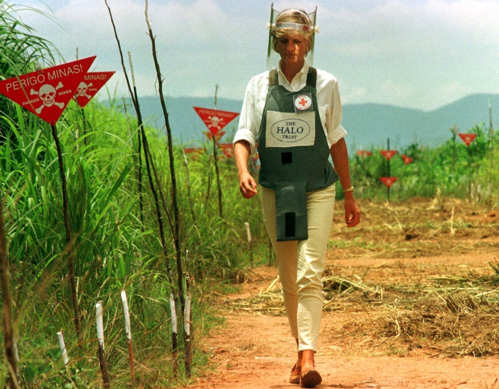 Diana, Princess of Wales, is seen in this Jan. 15 1997 file picture walking in one of the safety corridors of the land mine fields of Huambo, Angola, during her visit to help a Red Cross campaign to outlaw landmines worldwide. — File photo