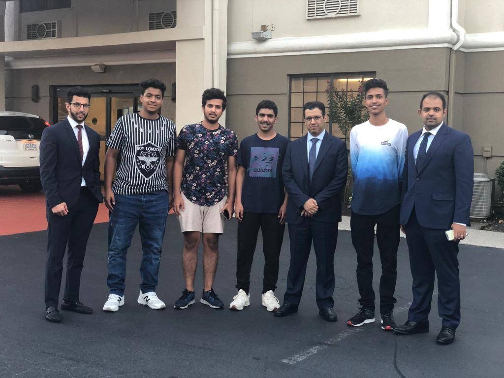 Majed Abul Ula, the head of the Saudi Affairs Department at the Kingdom’s Consulate in Houston, along with evacuated Saudis.