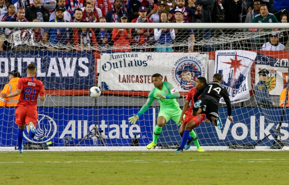 Mexico's foward Javier Hernandez (R) heads the ball to score against the United Sates during their international friendly football match between Mexico and the United States at the Metlife Stadium in East Rutherford, New Jersey, on Friday. — AFP