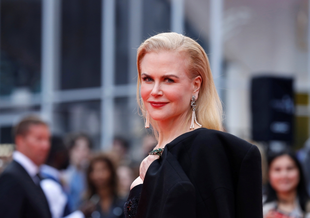 Nicole Kidman poses as she arrives at the world premiere of the drama 