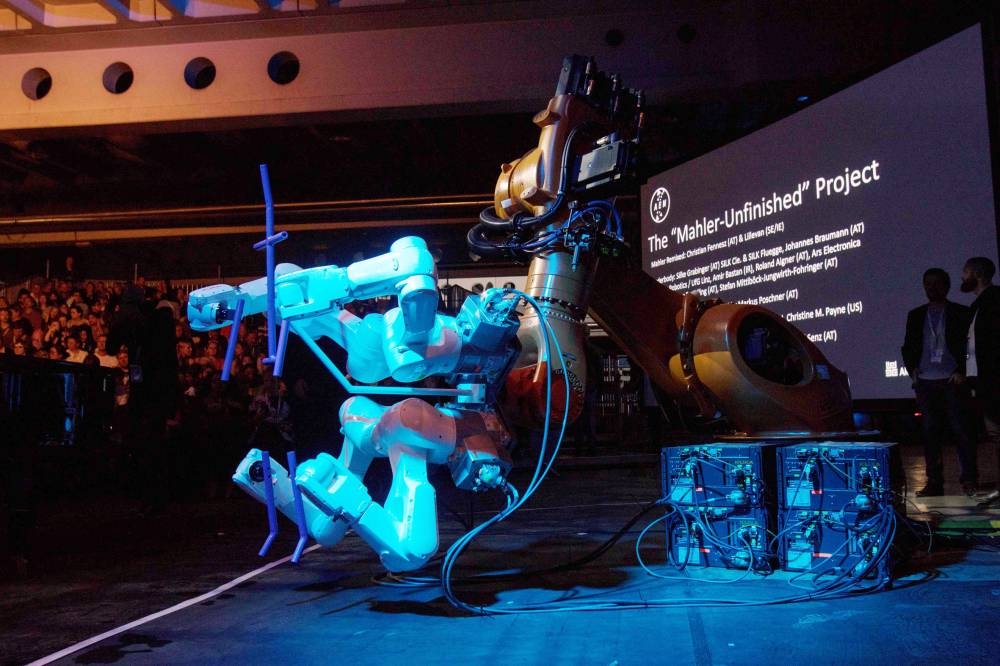 A robot stands on stage during the 