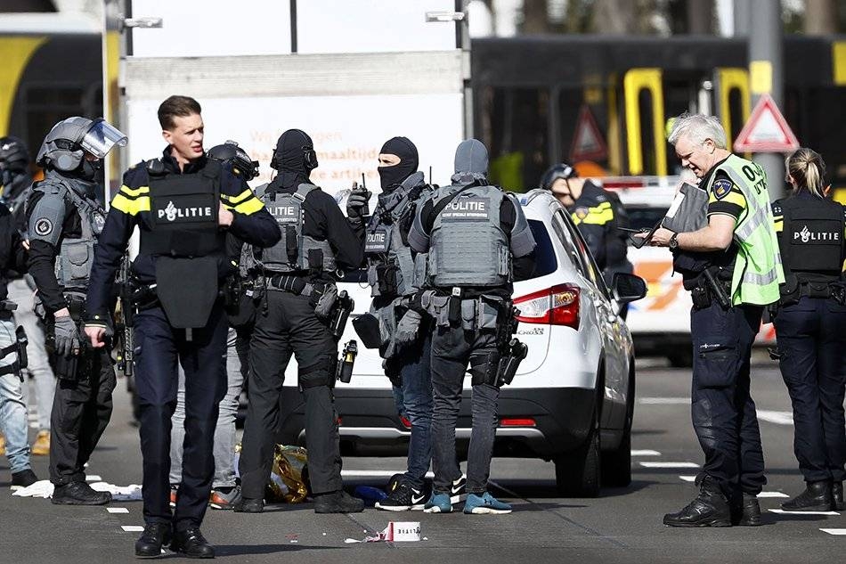 Police stand near a tram at the 24 Oktoberplace in Utrecht, the Netherlands, where a shooting took place, in this March 18, 2019 file photo. — AFP