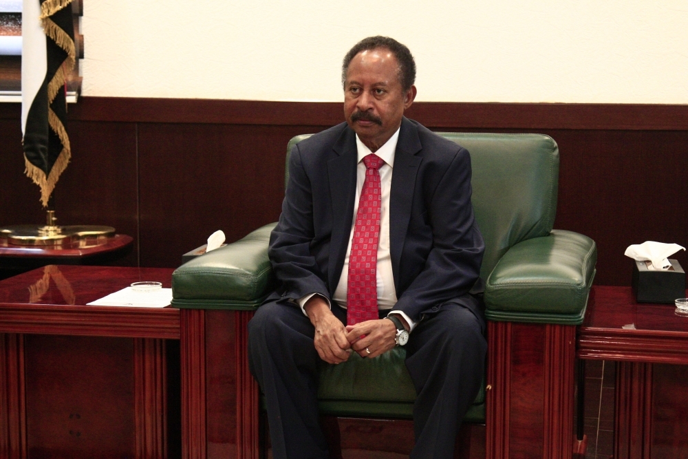 Sudanese Prime Minister Abdalla Hamdok, right, receives the Egyptian foreign minister, not pictured, in the Sudanese capital Khartoum on Monday. — AFP
