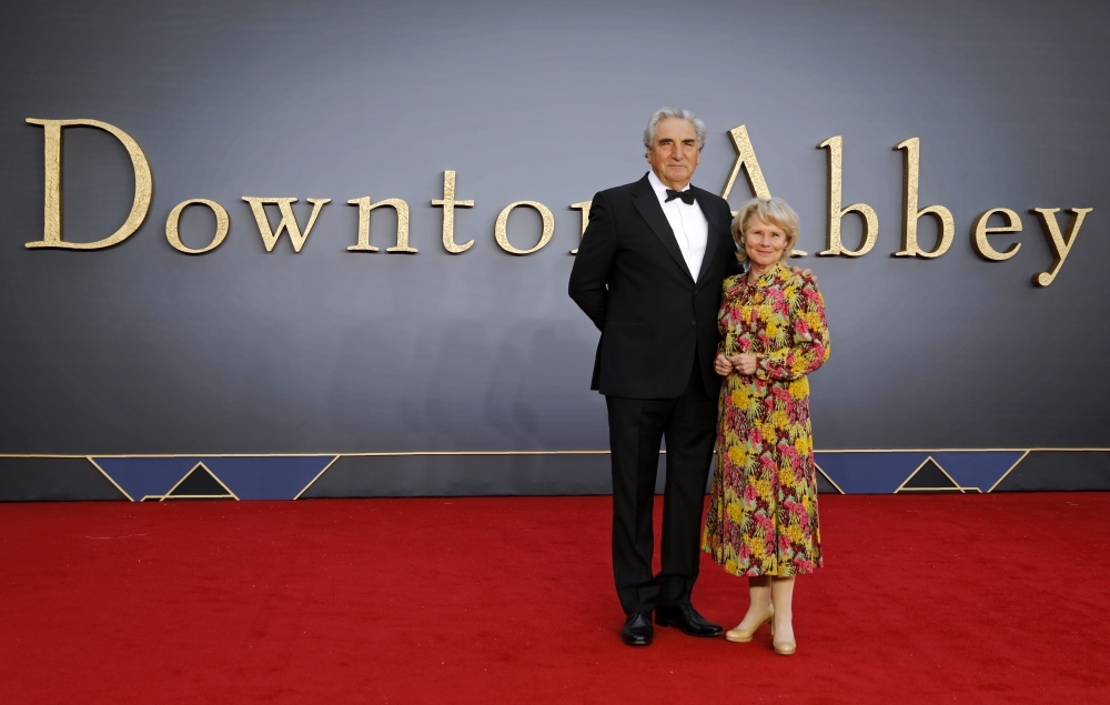 British actor Jim Carter, left, and British actor Imelda Staunton, right, pose on the red carpet upon arrival for the world premiere of the film 
