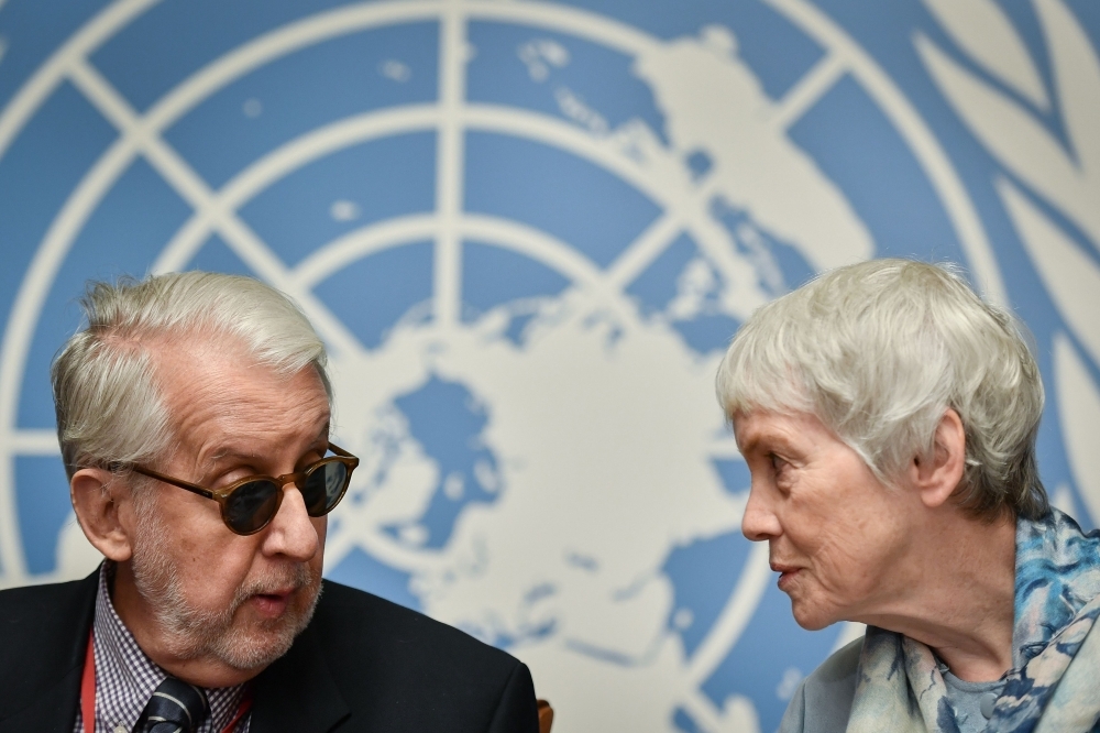 Members of the United Nations (UN) Commission of Inquiry on Syria, Karen Abuzayd, right, speaks with commission's chairman Paulo Pinheiro during a press conference to present the latest report on rights violations in Geneva on Wednesday. — AFP