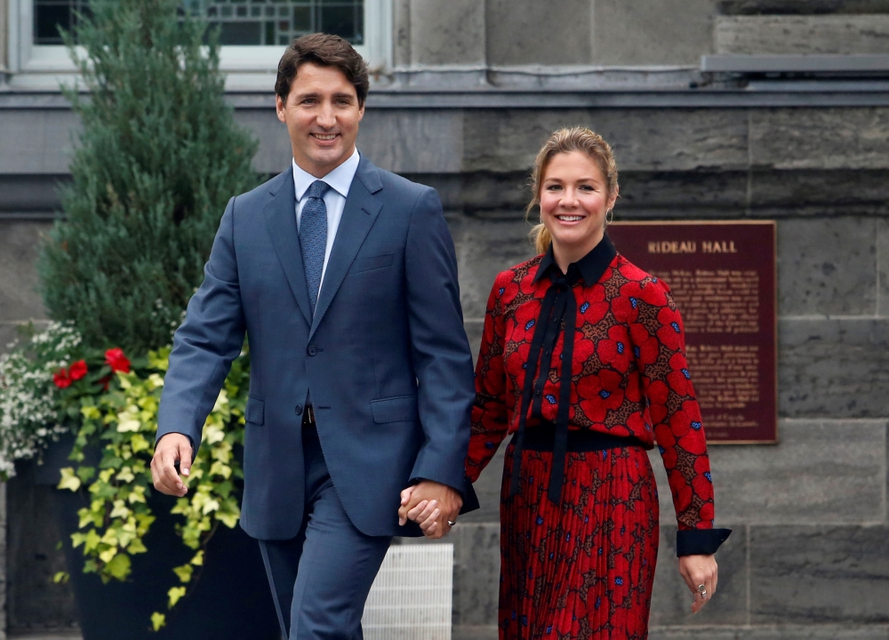 Canada's Prime Minister Justin Trudeau and his wife Sophie Gregoire Trudeau leave Rideau Hall after asking Governor General Julie Payette to dissolve Parliament, and mark the start of a federal election campaign in Canada, in Ottawa, Ontario, Canada, on Wednesday. — Reuters