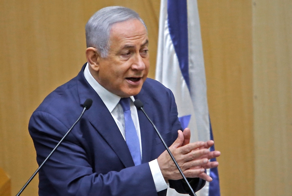 Israeli Prime Minister Benjamin Netanyahu delivers a speech at the Knesset in Jerusalem on Wednesday. — AFP
