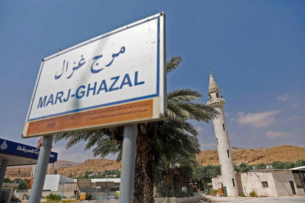 A sign leading to the Palestinian village of Marj Ghazal in the Jordan Valley in the Israeli-occupied West Bank is seen on Wednesday. — AFP