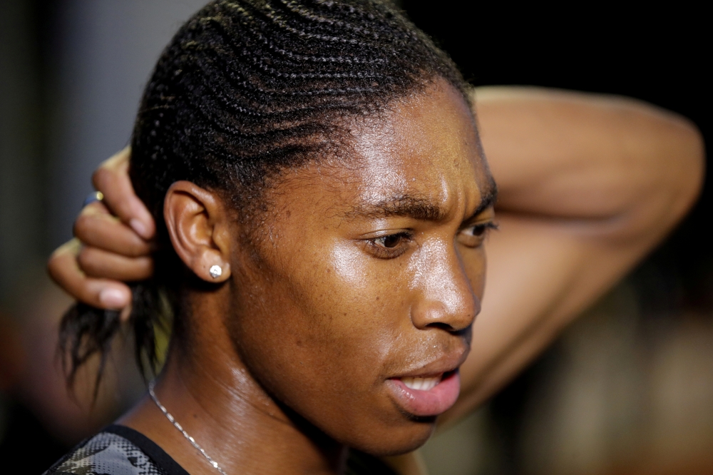 South African athlete Caster Semenya speaks with journalists after she raced during a 2,000 meters for the first time after her ban due to elevated testosterone levels, at a small meeting in Montreuil, near Paris, France, June 11, 2019. — Reuters
