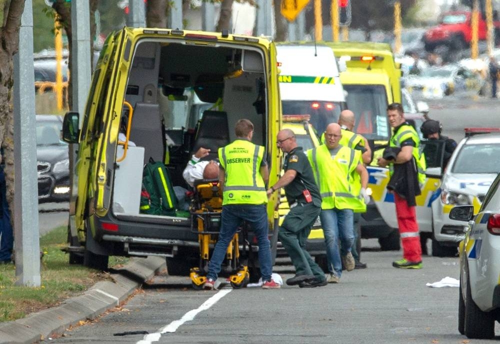 An injured person is loaded into an ambulance following a shooting at a mosque in Christchurch, New Zealand, in this file photo. — Reuters