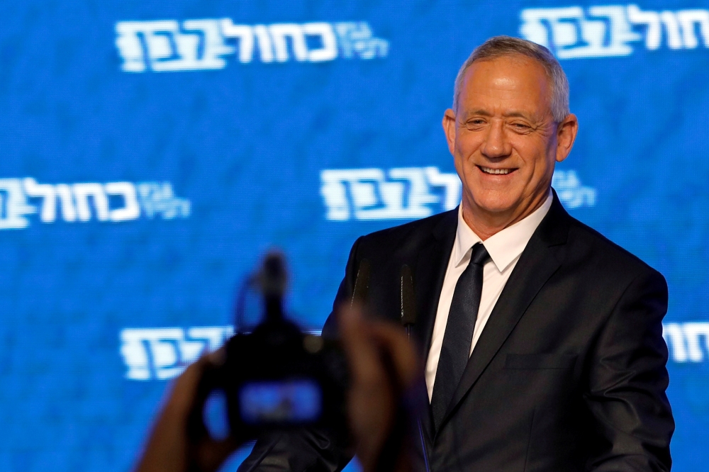 Benny Gantz, head of Blue and White party, smiles as he delivers a speech following the announcement of exit polls in Israel's parliamentary election at his party headquarters in Tel Aviv, Israel, in this April 10, 2019 file photo. — Reuters