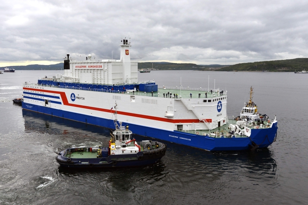 This file handout picture taken and released on Aug. 23, 2019, by the Russian nuclear agency ROSATOM shows the floating power unit (FPU) Akademik Lomonosov being towed from the Arctic port of Murmansk, northwestern Russia. The world's first floating nuclear power plant, developed by Russia, arrived on Saturday at its permanent parking port in Pevek, Russia's Far East, after traveling 5,000 kilometers in the Arctic. — AFP