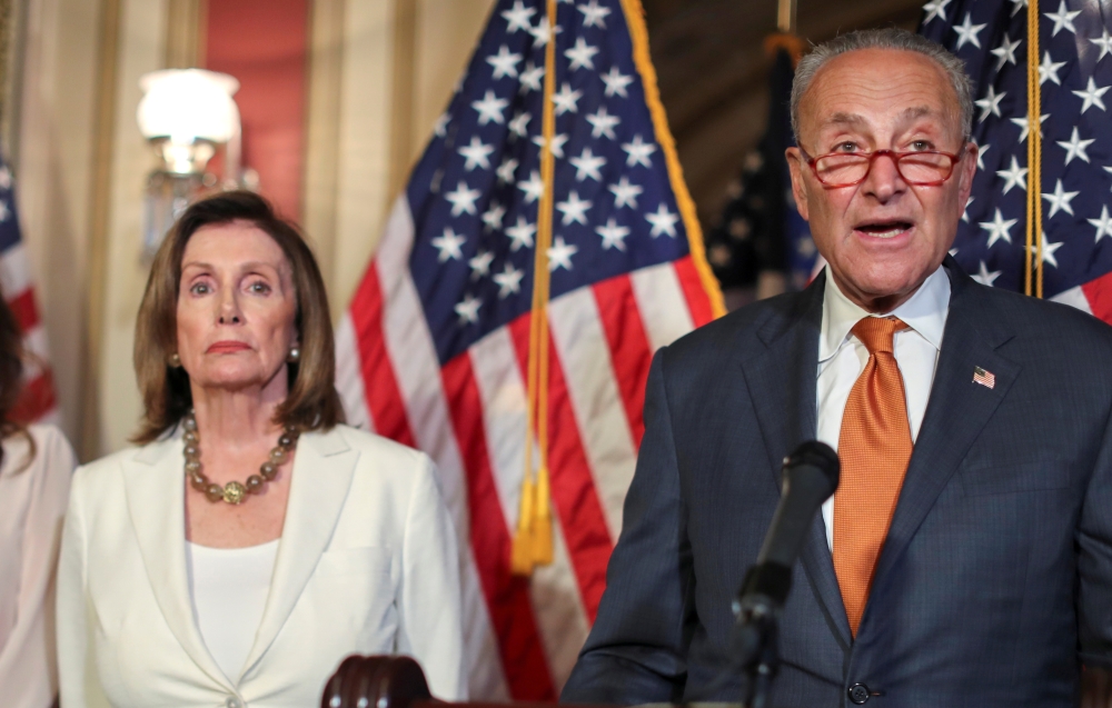  U.S. House Speaker Nancy Pelosi (D-CA) and Senate Minority Leader Chuck Schumer (D-NY) hold a news conference with fellow congressional Democrats to demand that the U.S. Senate vote on the House-passed 