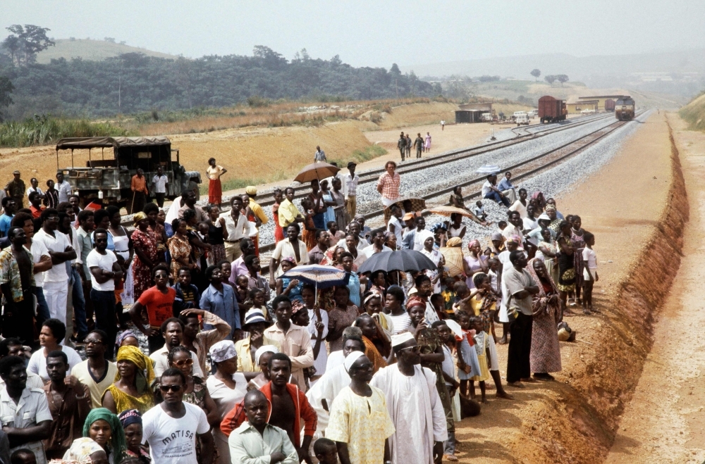  In this file photo taken on January 18, 1983, Gabonese take part in the inauguration of the second section of the Trans-Gabon Railway. -AFP