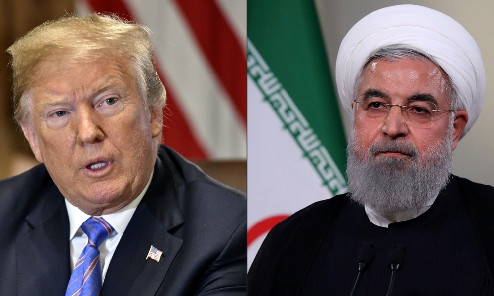 This combination of file pictures created on July 23, 2018 shows US President Donald Trump during a Cabinet meeting on July 18, 2018, at the White House in Washington, DC, and a file handout picture provided by the Iranian presidency on May 2, 2018 on showing President Hassan Rohani giving a speech on Iranian TV in Tehran. — AFP