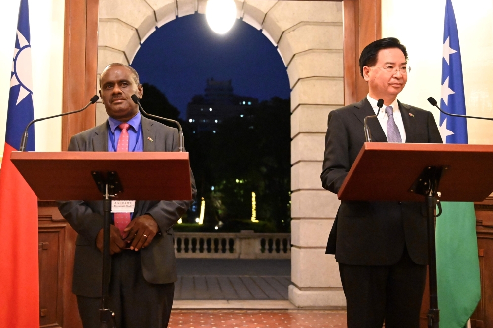 Taiwan's Foreign Minister Joseph Wu, right, takes part in a press conference with Solomon Islands' Foreign Minister Jeremiah Manele, left, at the Taipei Guest House in Taipei in this Sept. 9, 2019 file photo. — AFP