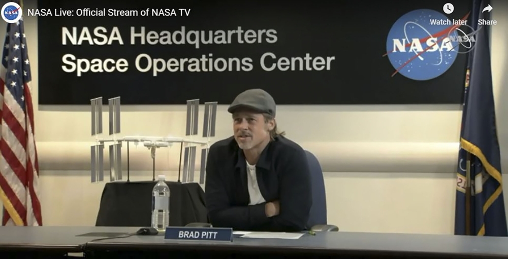This NASA TV frame grab obtained Monday shows US actor Brad Pitt during a live conversation with NASA officials and astronaut Nick Hague. -AFP
