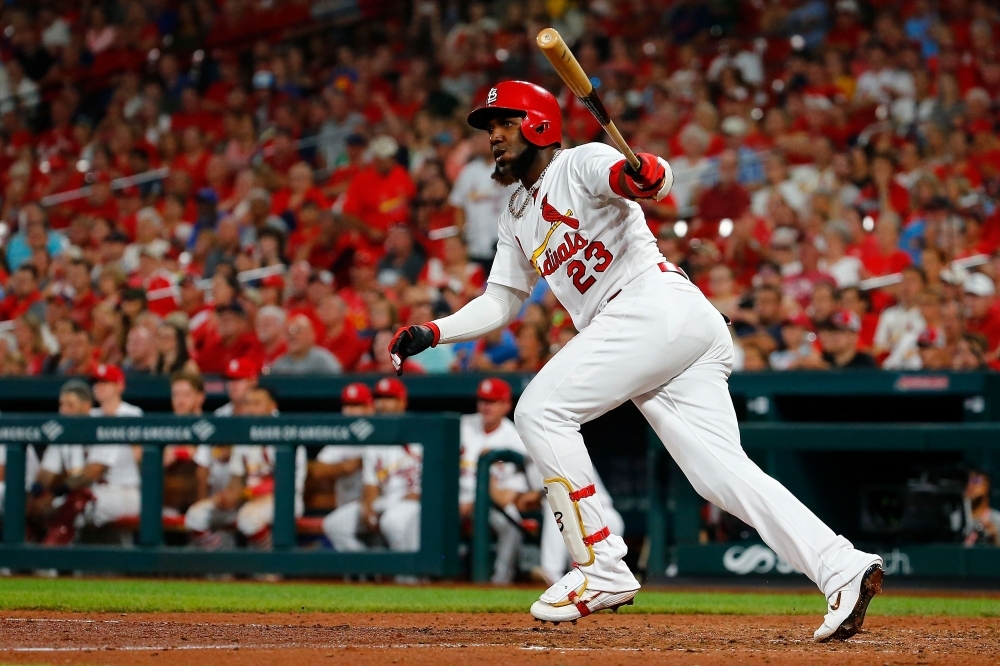 Marcell Ozuna of the St. Louis Cardinals drives in two runs with a ground-rule double against the Washington Nationals in the seventh inning at Busch Stadium in St Louis, Missouri, on Monday. — AFP
