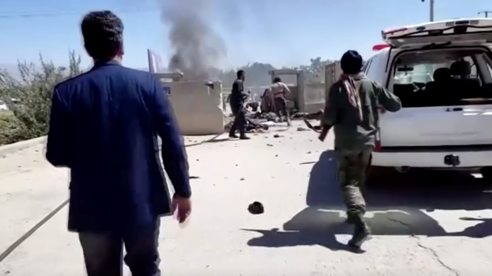 Security personnel is seen at the site of a blast near an election rally by President Ashraf Ghani in Parwan province, north of Kabul, Afghanistan, on Tuesday. — Reuters