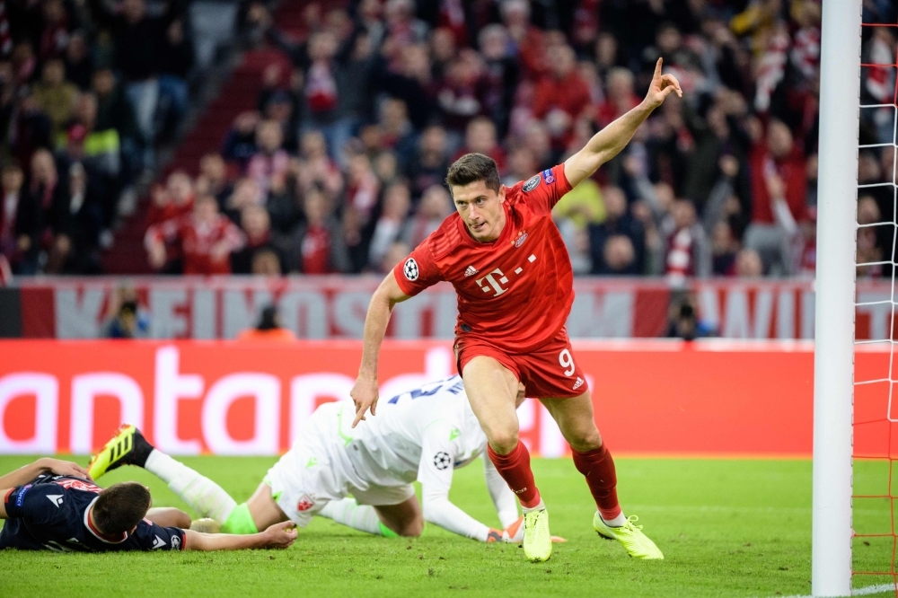 Bayern Munich's Polish forward Robert Lewandowski celebrate scoring a goal during the UEFA Champions League Group B football match between FC Bayern Munich and Red Star Belgrade (Crvena Zvezda) in Munich, southern Germany, on Wednesday. — AFP