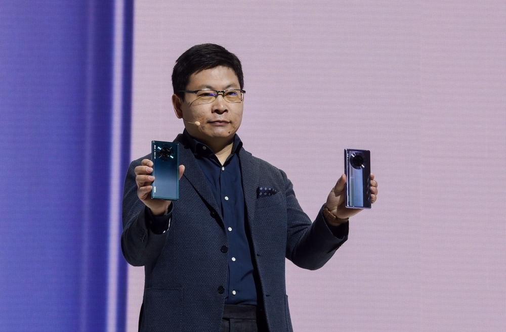 Richard Yu (Yu Chengdong), head of Huawei's consumer business Group, speaks on stage during a presentation to reveal Huawei's latest smartphones 