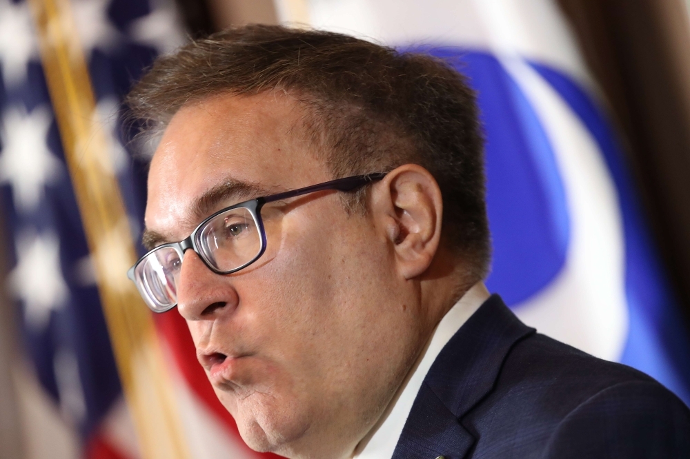 Environmental Protection Agency Administrator Andrew Wheeler makes a policy announcement at EPA headquarters in Washington, DC, on Thursday. Wheeler and Transportation Secretary Elaine Chao announced that the Trump administration would prohibit California from setting its own fuel economy standards, with Wheeler saying Federalism does not mean that one state can dictate standards for the rest of the country. — AFP