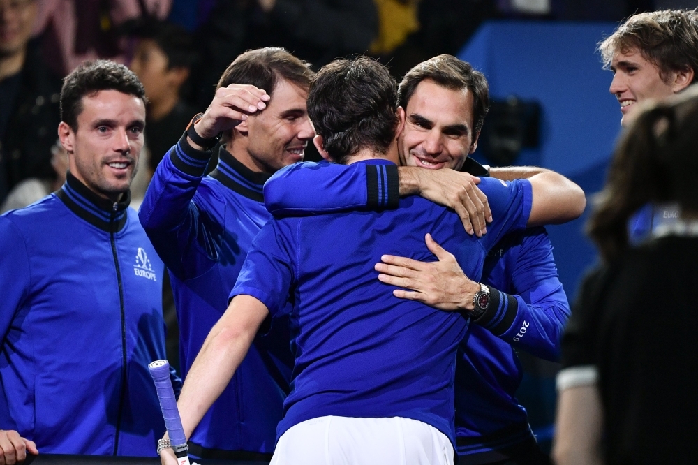 (From L) Team Europe's Roberto Bautista Agut, Rafael Nadal, Roger Fereder and Alexander Zverev celebrate the victory of teammate Dominic Thiem (3rd L, back) over Team World's Denis Shapovalov during their match at the 2019 Laver Cup tennis tournament in Geneva, on Friday. — AFP