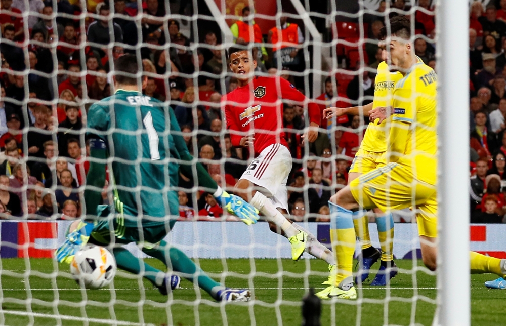 Manchester United's Mason Greenwood scores their first goal against Astana  in the Europa League Group L match at the Old Trafford, Manchester, Britain, on Thursday. —  Reuters