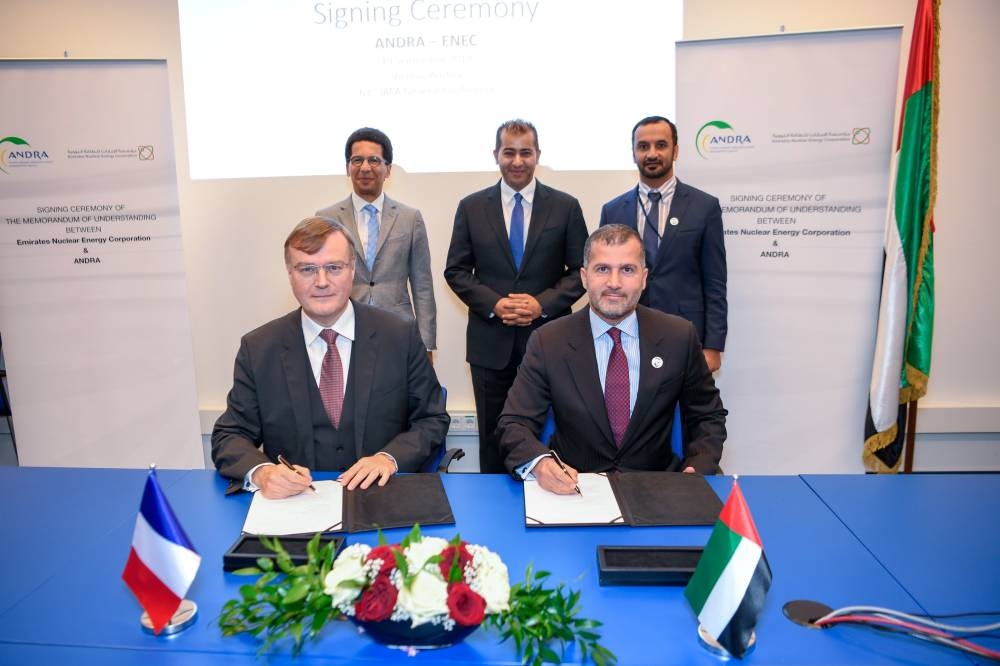 Eng. Mohamed Al Hammadi, Chief Executive Officer of ENEC, and Pierre-Marie Abadie, Chief Executive Officer of Andra, during the MoU signing, in the presence of Ambassador Hamad Al Kaabi, Permanent Representative of the UAE to the IAEA, and H.E. Xavier Sticker, Permanent Representative of France to the United Nations and International Organisations in Vienna.

