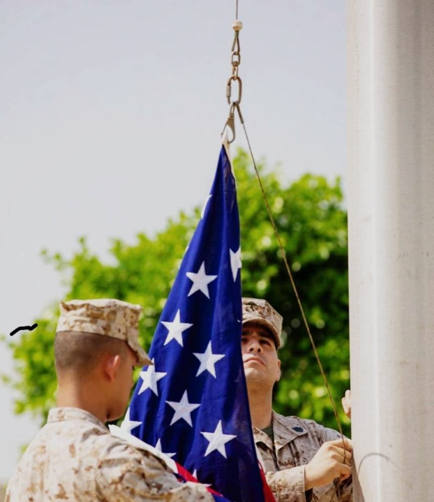 US Consulate General Jeddah’s Marine Security Guard Detachment lowers the flag at the former location in Al-Hamra district for the last time after 65 years on Sept. 20. The flag was raised shortly thereafter at the new Consulate in Al-Mohammadiyah District. — Courtesy photo