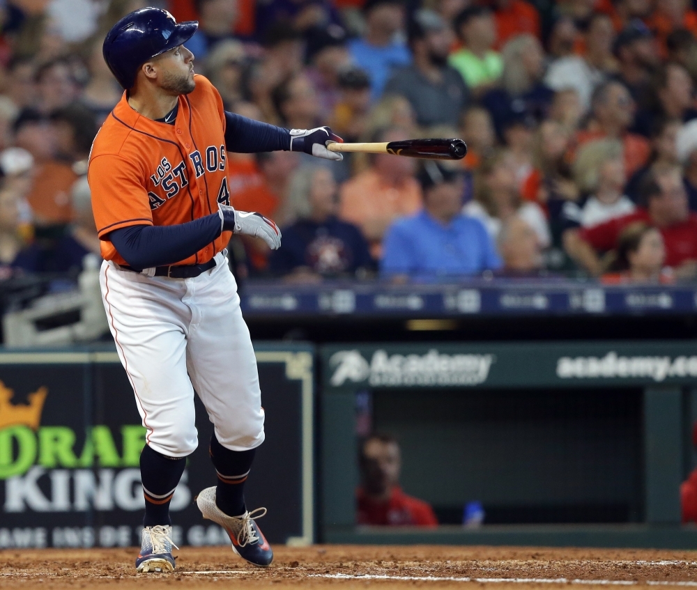 George Springer No. 4 of the Houston Astros hits his third home run of the game in the fourth inning against the Los Angeles Angels at Minute Maid Park on Sunday in Houston, Texas. — AFP