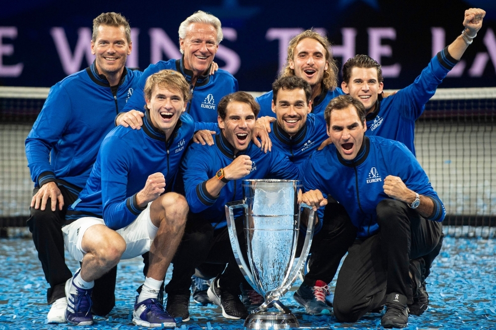 Team Europe's composed of (From down L) Alexander Zverev, Rafael Nadal, Roger Federer, (From up R) Dominic Thiem, Stefanos Tsitsipas, Fabio Fognini, and their Captains Bjorn Borg and Thomas Enqvist celebrate after winning the 2019 Laver Cup tennis tournament in Geneva, on Sunday. — AFP 