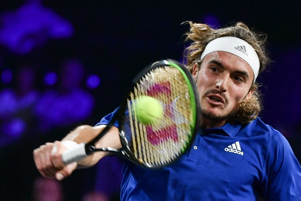 Team Europe's Stefanos Tsitsipas returns the ball to Team World's Taylor Fritz during their match as part of the 2019 Laver Cup tennis tournament in Geneva in this Sept. 20, 2019 file photo. — AFP