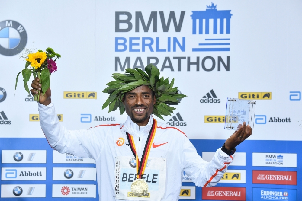 Winner Ethiopia's Kenenisa Bekele poses during the medal ceremony of the Berlin Marathon in Berlin, on Sunday. — AFP
